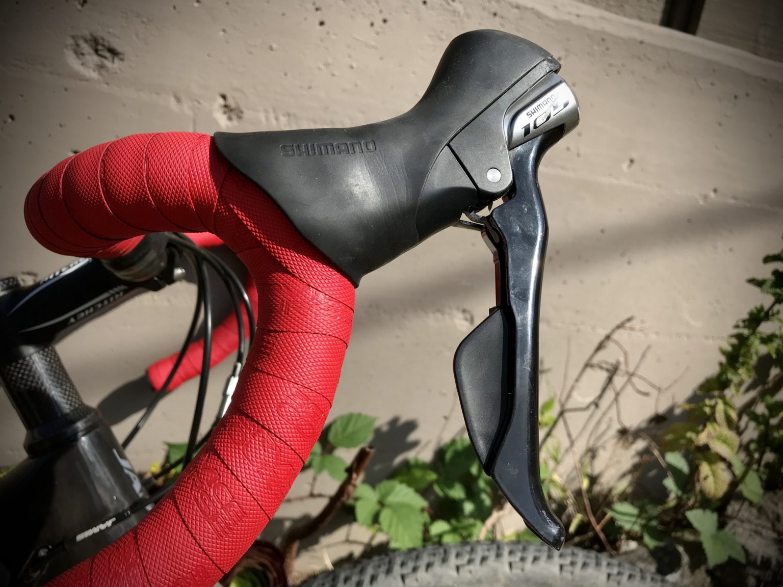 Shimano STI lever reach adjustment and fix for a loose screw bikedale